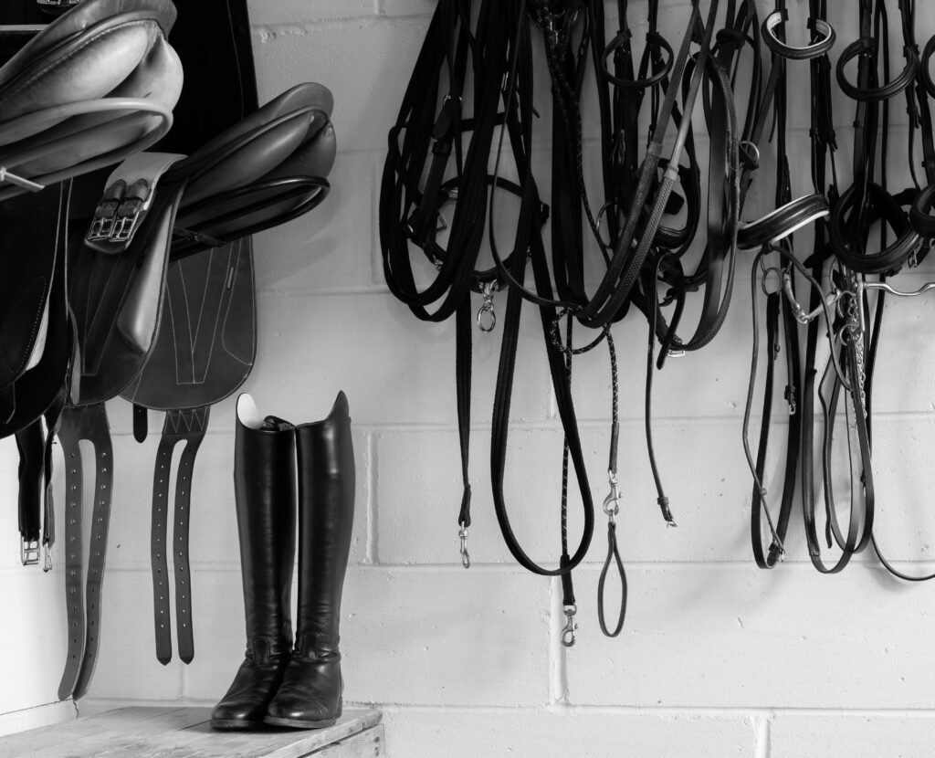 saddlery items tack room black and white riding boots
